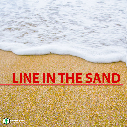 Waves reaching a sandy shore