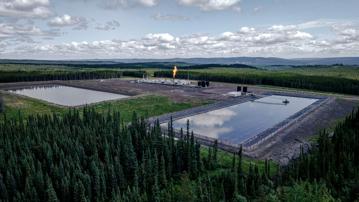 Aerial view of fracking ponds surrounded by forest.