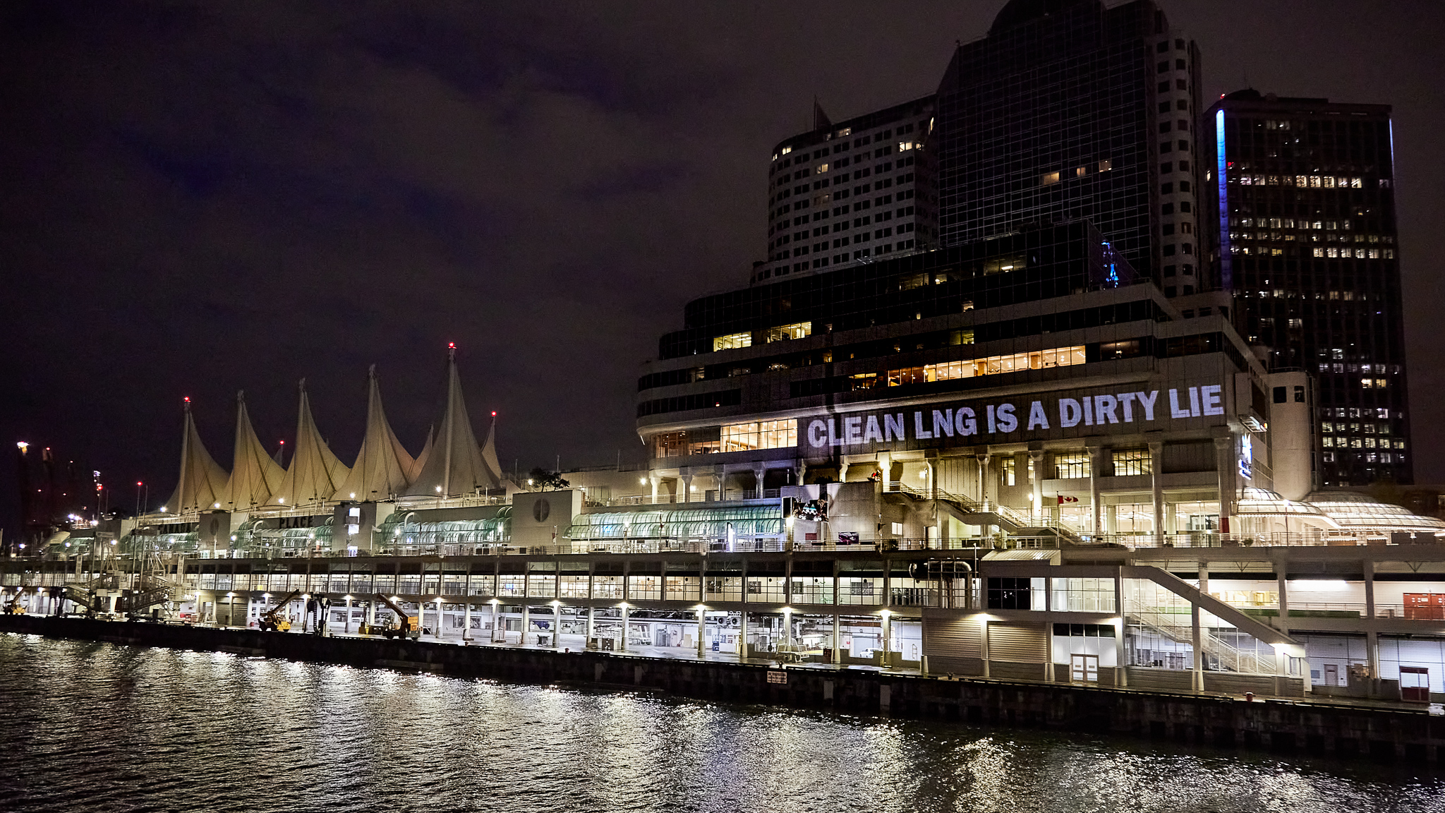 Clean LNG is a dirty light projected onto Canada Place.