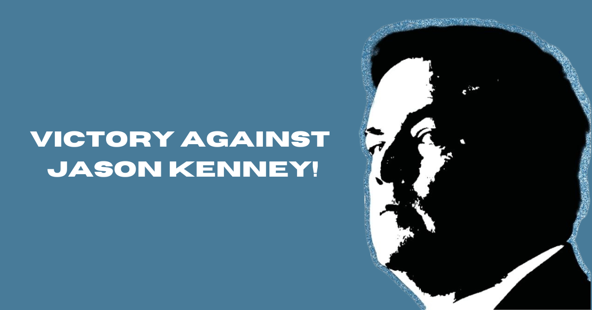 A black and white photo of Jason Kenney. Text on the image says "Victory Against Jason Kenney". End of image description.