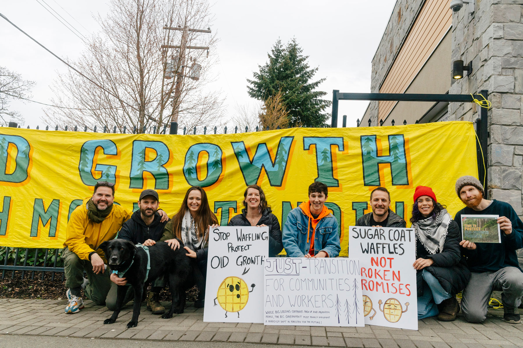 Old-growth protesters in front of banner and signs, Victoria B.C.