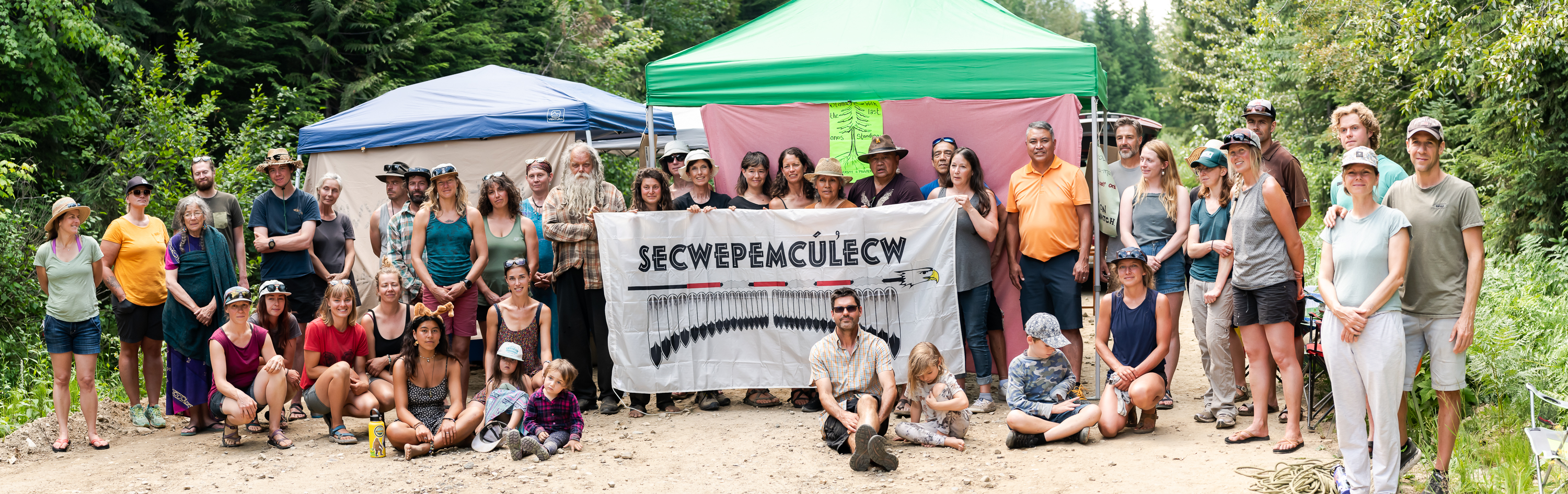 Old Growth Revylution blockades with the Splatsin members of the Secwépemc Nation at the entrance of Big Mouth Forest Service Road off Highway 23, about 120 kilometres north of the city. (Submitted by Old Growth Revylution)