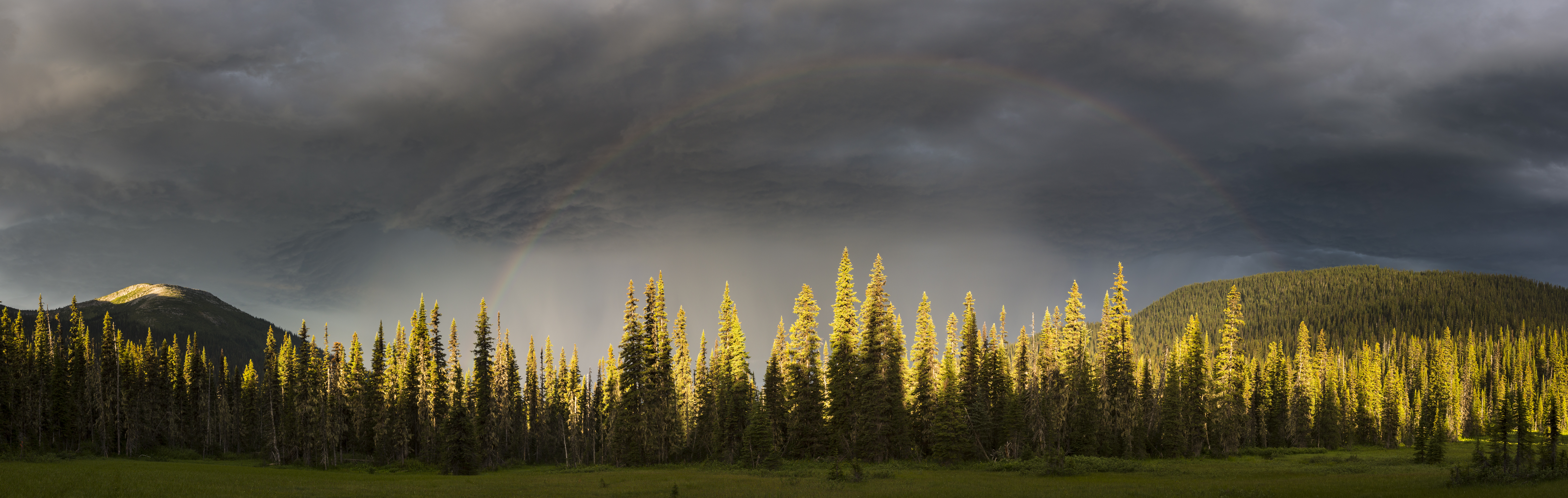 Thunder storm and rainbow in the Cariboo Mountains (David Moskowitz).