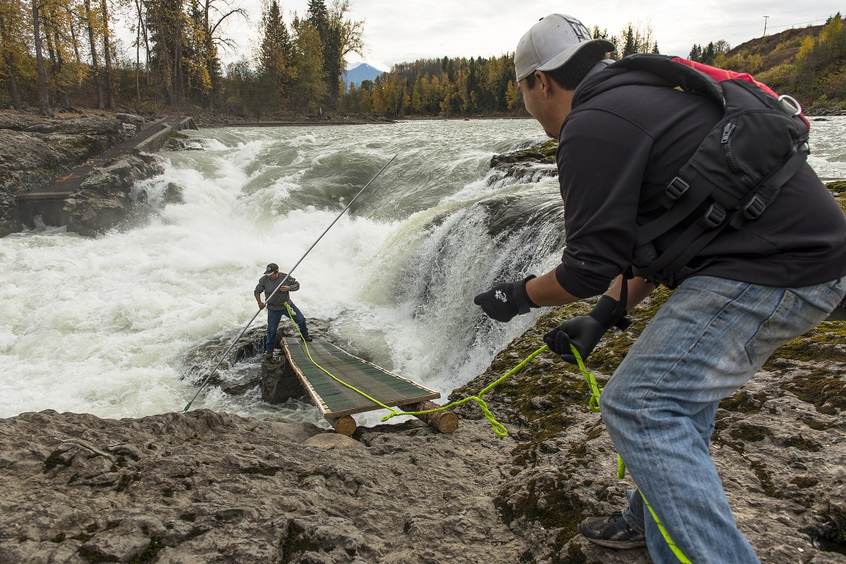 Members of Witset First Nation fishing. End of image description.
