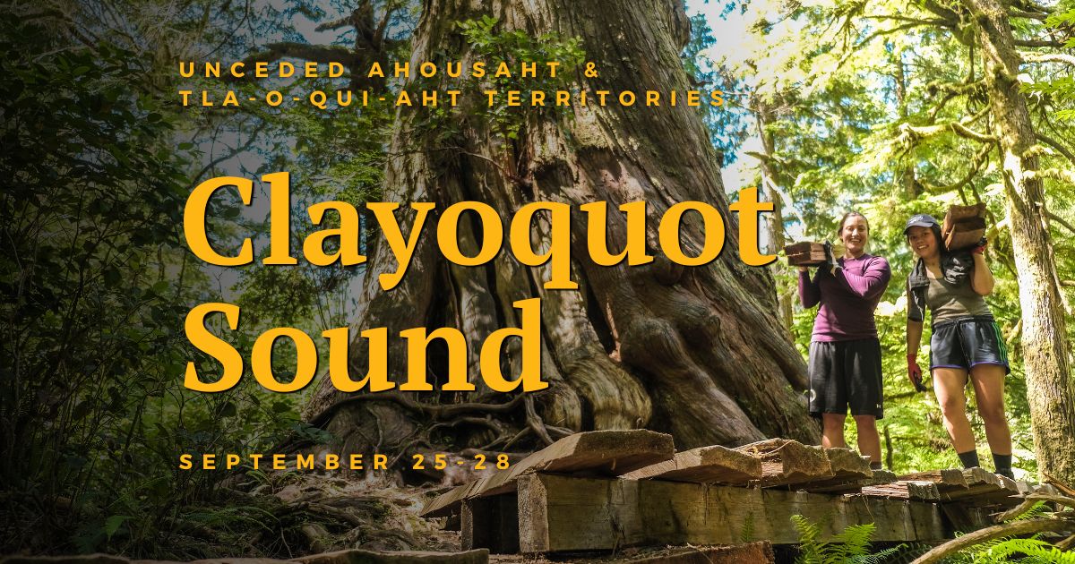 Two people carrying wood up a boardwalk. Text on the image says "Unceded Ahousaht & Tla-o-qui-aht Territories. Clayoquot Sound. September 25-28." End of image description.
