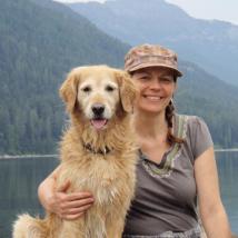 Headshot of Paula Neuman with her dog