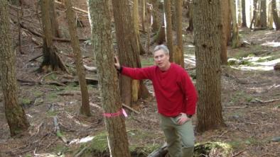 Joe Foy on Ford Mountain ridgeline checking out area of spotted owl habitat slated for logging