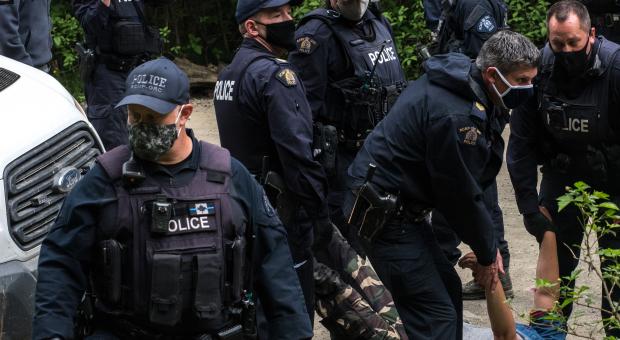 RCMP arresting a protester (Photo: Mike Graeme)