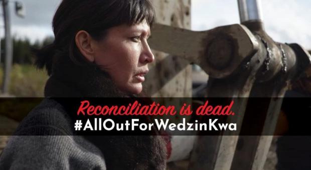 Molly Wickham (Sleydo) in front of heavy machinery. The text reads "Reconciliation is dead. #AllOutforWedzinKwa".