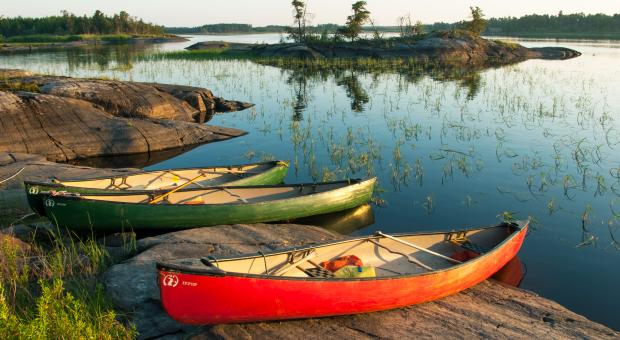 Canoes on the shore of Rice River in Hollow Water First Nation territory.