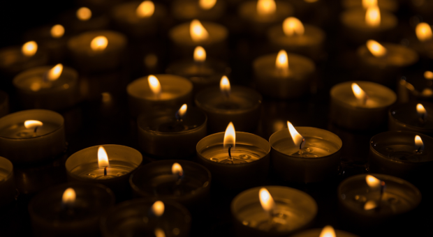 Tea light candles in the dark. 