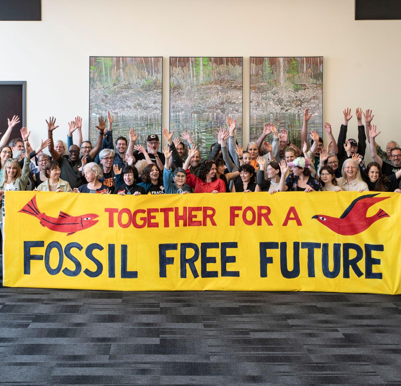 FrackFree BC conference attendees with banner.