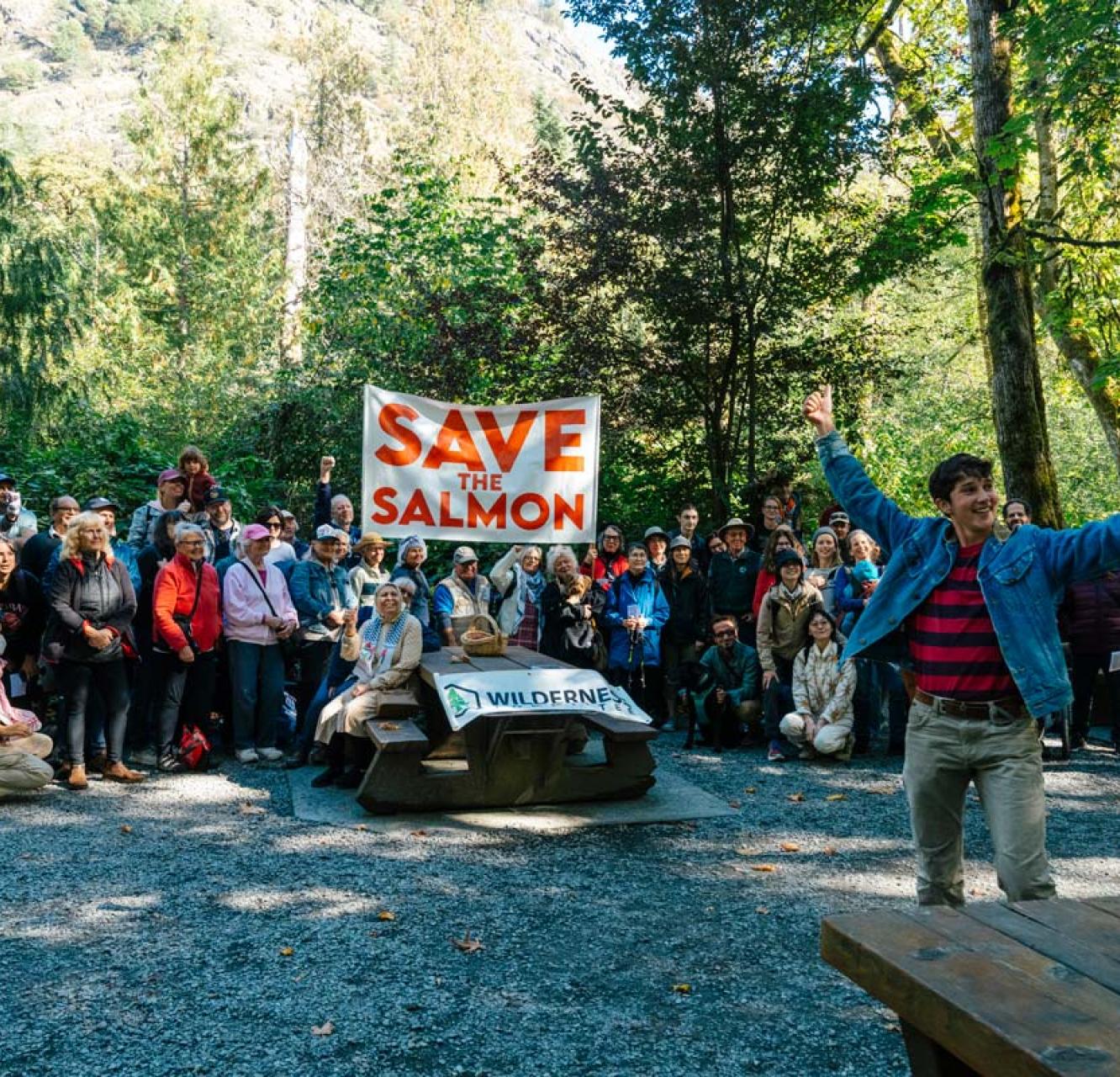 An enthusiastic group of people gathered in the forest to save Goldstream/SELEKTEL