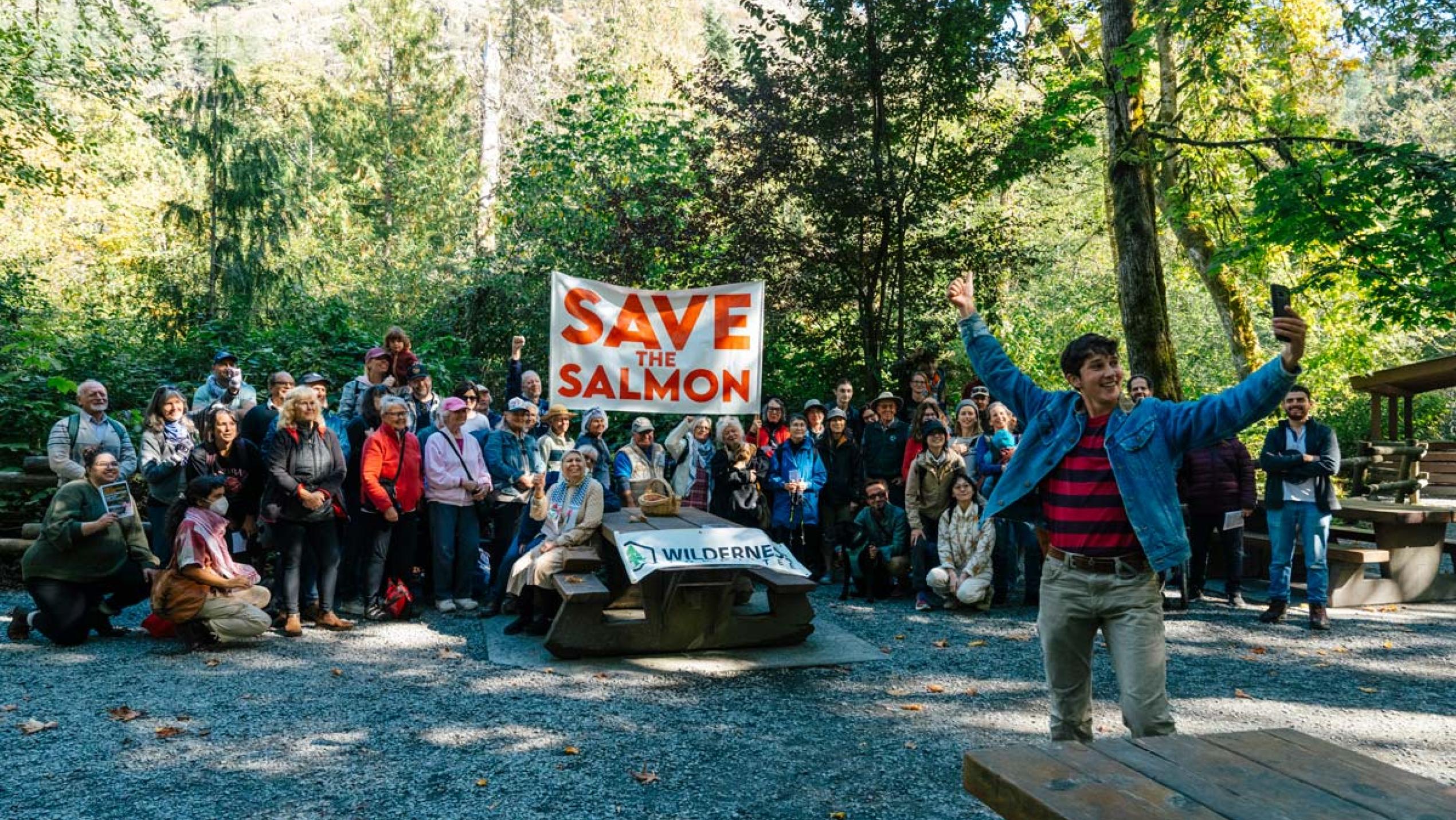 An enthusiastic group of people gathered in the forest to save Goldstream/SELEKTEL
